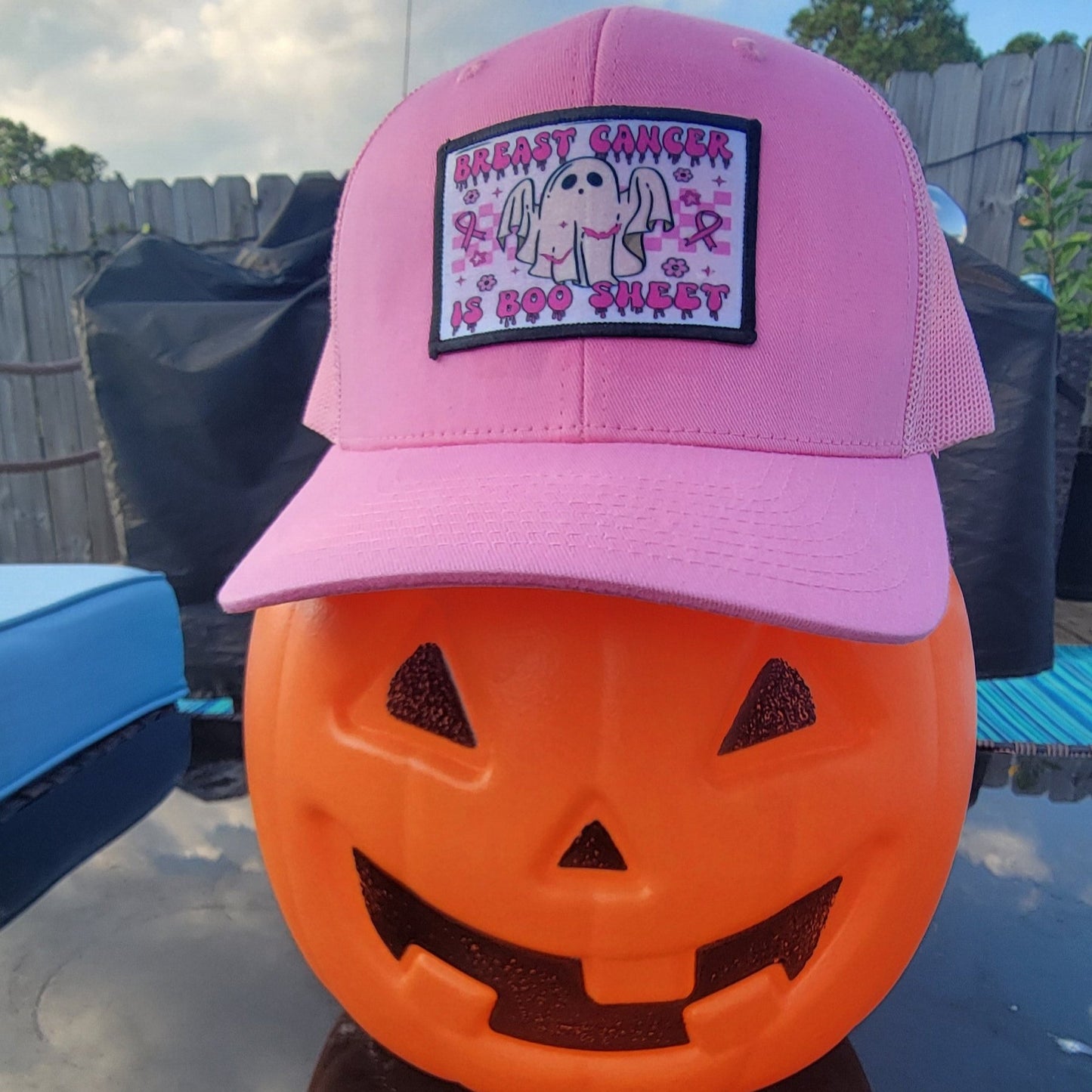 Pink trucker hat with a Breast Cancer is Boo sheet hat